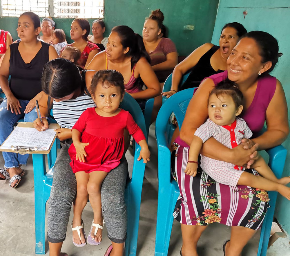Families await free medical services at day-long health fair